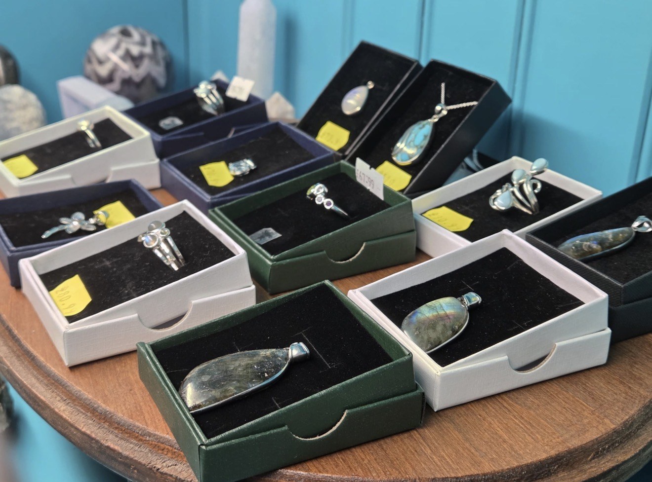 Boxed crystal jewellery and palm stones at The Wenlock Witch